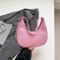 Pink crescent hobo bag in textured fabric with golden metal buckle and shoulder strap - Pink