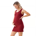 Detail view of the side ruching and stretchy modal fabric on this maternity dress - S / Burgundy