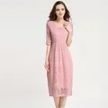 Pink lace maternity dress with short sleeves and round neck in a slim fit silhouette - XS / Pink