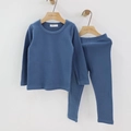 Detail view of smog blue cotton pajama set for kids hanging on a wooden hanger - Lake Blue / 90cm