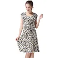 Floral maternity dress in black with white daisy print and stylish waist twist detail - M / Black White Floral
