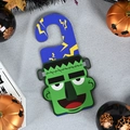 Halloween Frankenstein door hanger decoration with green face and bolt details - Green Monster