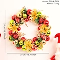 Ghirlanda di Natale con palline galvanizzate vivaci e fiori di poinsettia dorati. - Ghirlanda di Sfere Galvaniche Rosso Verde Oro (XM-0025)