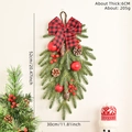 Christmas teardrop swag with red berries, pine cones and buffalo plaid bow decoration - Upside Down Tree Swag