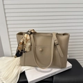 Minimalist beige tote bag with a decorative silk scarf on handle for casual daily commuting - Khaki