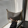 Minimalist grey woven shoulder bag with a bold gold chain strap and zipper closure - Black
