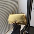 Luxurious gold crocodile pattern handbag with elegant V-shaped metal buckle and chain strap - Gold