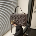Dark brown quilted faux leather crossbody bag with elegant gold twist lock and handle - Brown