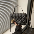 Classic black quilted crossbody bag with golden lock and chain detail in vegan leather - Black