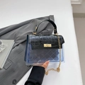 Sac à main bleu en PVC transparent et poignée noire à motif crocodile avec chaîne dorée - Noir