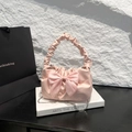 Pale pink pleated handbag with a large mesh bow and silver chain strap for women - Pink