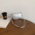 Silver lychee leather crescent bag with metallic woven strap in hobo style - Silver