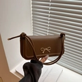 Elegant dark brown bow handbag with matte leather finish and knotted strap detail - Brown