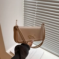 Elegant beige bow shoulder bag with gold clasp and minimalist dual strap design - Khaki