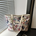 Elegante borsa tote crema con vivaci stampe di farfalle e manici in pelle - Farfalla Colorata
