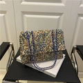 Retro floral brocade shoulder bag with blue chain straps and vintage flower pattern - Blue
