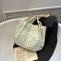 Elegante borsa tote verde menta con texture a bolle, fiocchi neri e manici in corda - Verde