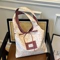 Borsa tote reversibile in tela con stampa floreale arancione e motivo a quadretti blu - Arancione e Blu
