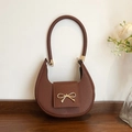 Dark brown crescent underarm bag with gold bow ornament and cross-grain leather texture - Brown