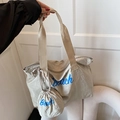 Beigefarbene Streetstyle-Einkaufstasche mit Beach-Print und passender kleiner Tasche - Khaki