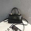 Elegant black leather handbag with embossed texture and gold fashion lettering for women - Black