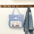 Hellblaue große Tragetasche mit transparenten Taschen und lässiger Ästhetik - Blau