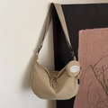 Khaki half-moon crossbody bag with adjustable strap and small round coin purse charm - Khaki