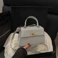 Silver glitter trapezoid handbag with gold rotating metal lock and detachable strap - Silver