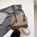 Borsa a conchiglia in tela monogramma beige con finiture in pelle marrone e manico - Marrone