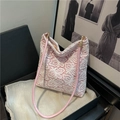 Pink faux leather shoulder bag with white floral lace embroidery and gold metal hardware - Pink