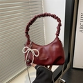 Deep red pleated cloud bag in soft leather with pearl bow charm and silver chain - Red