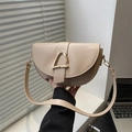Elegant light beige saddle bag with a golden D-shaped buckle for urban commuting - Khaki