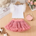 Détail du haut blanc à volants et de la jupe tutu en tulle rose pour fille - 110cm / Blanc & Rose