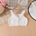 Détail d'un gilet en tricot blanc pour bébé avec des boutons décoratifs en fleurs - Blanc / 100cm-4Y