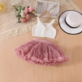 Detailed view of white knitted vest with daisy buttons and pink mesh tutu skirt - White Top + Pink Skirt / 100cm-4Y