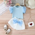 Zomerse meisjeskledingset met lichtblauwe pofmouwen en witte korte broek met grote strik - 90cm-3Y / Lichtblauw