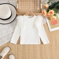Detail of white long-sleeved girls' top with layered tulle ruffle on the shoulders - White / 100cm-4Y