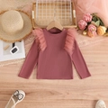 Detail of girls ribbed long sleeve top featuring delicate mesh ruffle shoulder accents - Rouge Red / 100cm-4Y