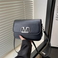 Minimalist black matte leather crossbody square bag with silver metal M logo detail - Black
