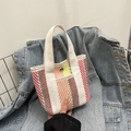 Colorful striped woven tote bag with white ribbon handles and a practical front pocket - Style 2