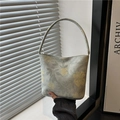 Floral print fabric bucket bag in sage green with yellow flowers and slim handles - Green
