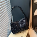 Fashionable black sequin baguette shoulder bag with shimmering finish and knotted handle - Black