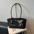 Elegant black snakeskin embossed tote bag with a pearl bow and heart charm detail - Black With Heart Pearl Bow Charm