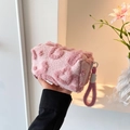 Pink plush clutch bag with heart texture and matching wrist strap for women - Light Pink