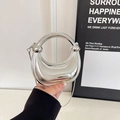 Silver mirror finish arc handbag with round handle and beaded details in metallic silver - Silver