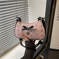 Pink seersucker hobo bag with black bows and heart pendant detail for women - Pink