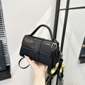 Mini black oiled leather crossbody bag with silver hardware and top handle for women - Black
