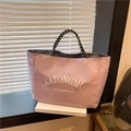 Borsa tote rosa con manici intrecciati e tasca laterale per uso quotidiano - Rosa