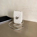 Cream quilted mini crossbody phone bag with silver bow buckle and chain strap - Off White