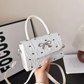 Borsa a tracolla bianca plissettata con stampe a fiocco nero e fiocco in argento - Bianco